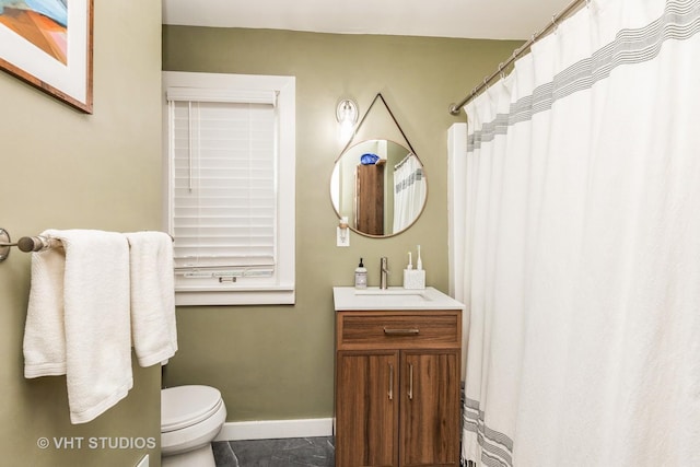 490 W Crystal Lake Ave, Crystal Lake, IL 60014 - bathroom with toilet, baseboards, vanity, and a shower with shower curtain