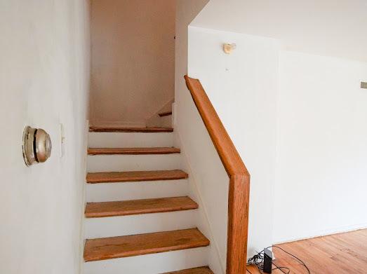 64 Ash St, Park Forest, IL 60466 - stairway featuring wood finished floors