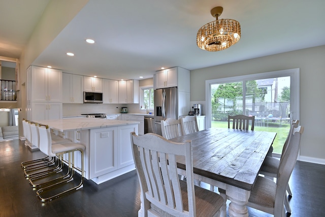 771 S Euclid Ave, Elmhurst, IL 60126 - dining space featuring dark wood-style flooring, a chandelier, recessed lighting, and baseboards