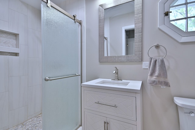 771 S Euclid Ave, Elmhurst, IL 60126 - bathroom featuring a stall shower, vanity, and toilet