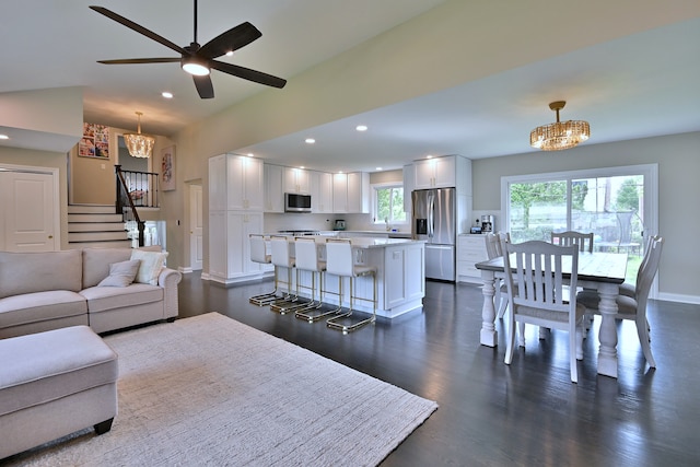 771 S Euclid Ave, Elmhurst, IL 60126 - living area featuring stairway, a chandelier, recessed lighting, dark wood finished floors, and baseboards