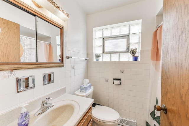 3645 W 66th St, Chicago, IL 60629 - full bath with tile walls, vanity, toilet, and curtained shower