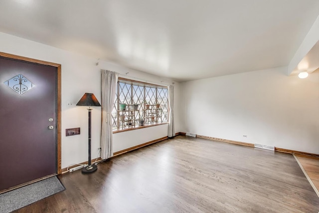 3645 W 66th St, Chicago, IL 60629 - entrance foyer with wood finished floors and baseboards