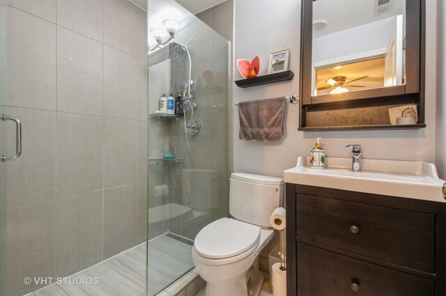 1849 W Newport Ave Unit 1, Chicago, IL 60657 - full bath with a tile shower, vanity, and a ceiling fan