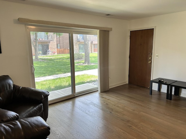 9814 Bianco Ter Unit 1B, Des Plaines, IL 60016 - living area with wood finished floors and baseboards