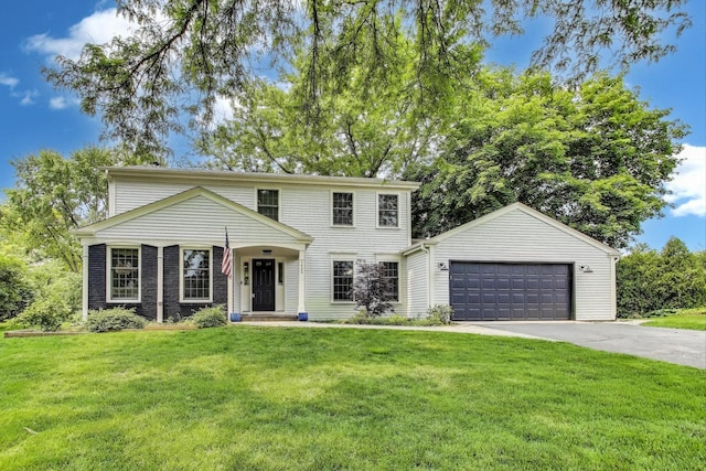 1480 Briar Cv, Wheaton, IL 60189 - view of front of home featuring concrete driveway, a front yard, and a garage