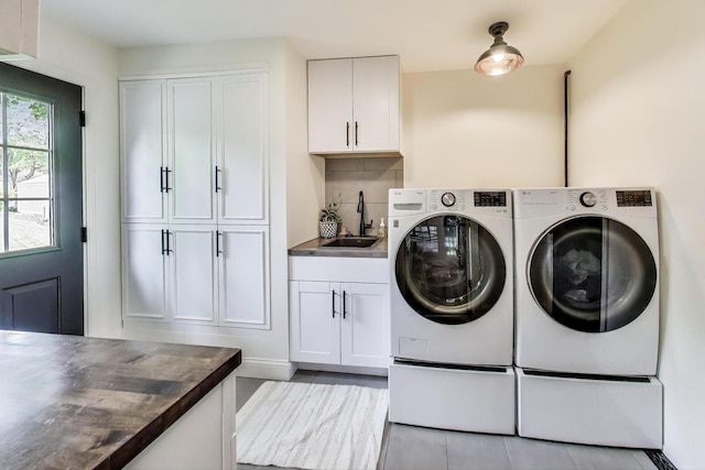 1480 Briar Cv, Wheaton, IL 60189 - washroom featuring separate washer and dryer and cabinet space