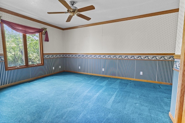 2 Lake Metonga Trl, Grant Park, IL 60940 - carpeted spare room with crown molding, ceiling fan, a wainscoted wall, and wallpapered walls