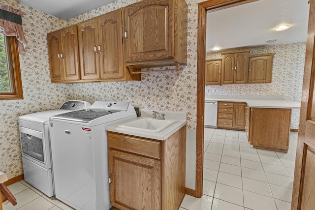 2 Lake Metonga Trl, Grant Park, IL 60940 - washroom featuring wallpapered walls, washing machine and dryer, light tile patterned floors, and cabinet space