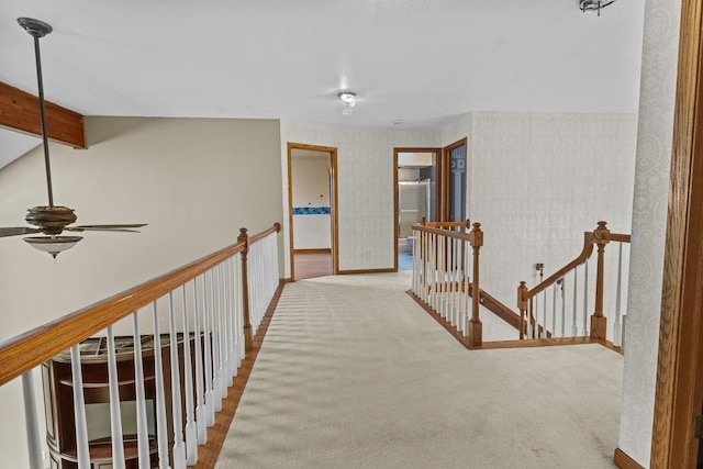 2 Lake Metonga Trl, Grant Park, IL 60940 - corridor with an upstairs landing, carpet floors, beamed ceiling, and wallpapered walls