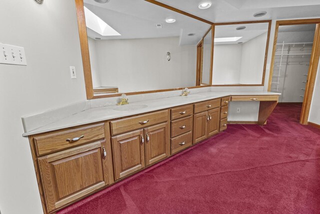 2 Lake Metonga Trl, Grant Park, IL 60940 - full bathroom featuring a skylight, double vanity, carpet flooring, and recessed lighting