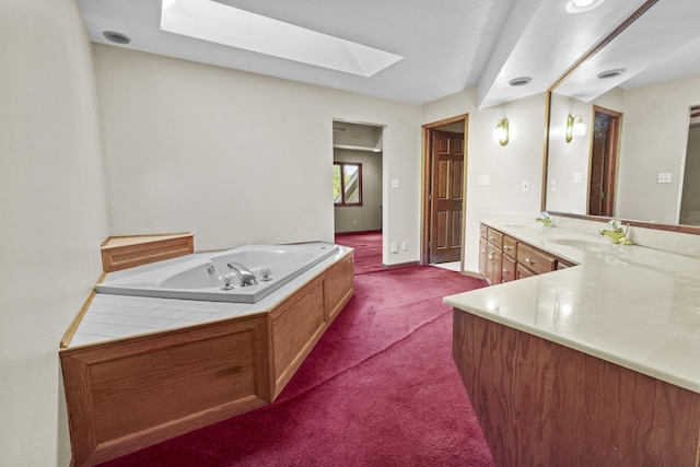 2 Lake Metonga Trl, Grant Park, IL 60940 - bathroom with vanity, a skylight, and a bath