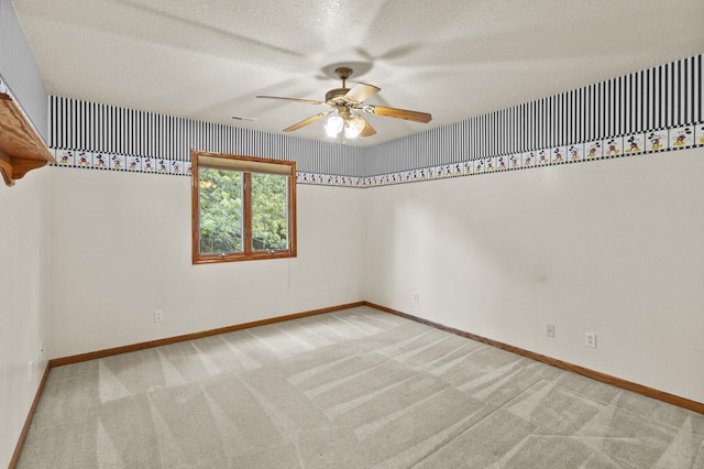 2 Lake Metonga Trl, Grant Park, IL 60940 - unfurnished room featuring carpet floors, a ceiling fan, and a textured ceiling