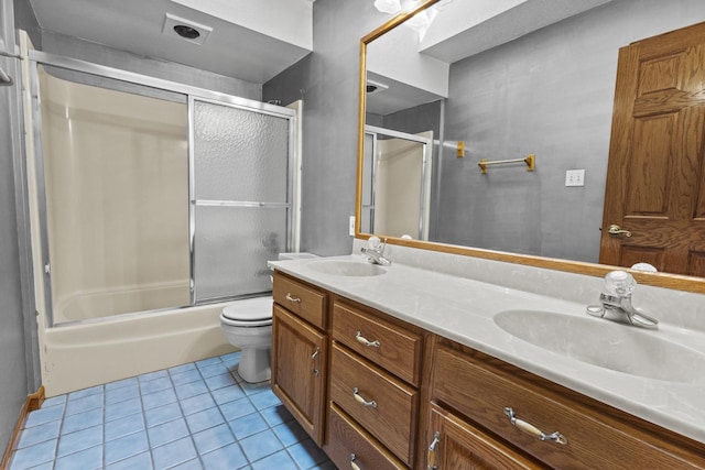 2 Lake Metonga Trl, Grant Park, IL 60940 - bathroom featuring tile patterned floors, double vanity, and combined bath / shower with glass door