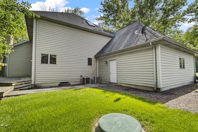 2 Lake Metonga Trl, Grant Park, IL 60940 - back of house with a yard, a wooden deck, and a shingled roof