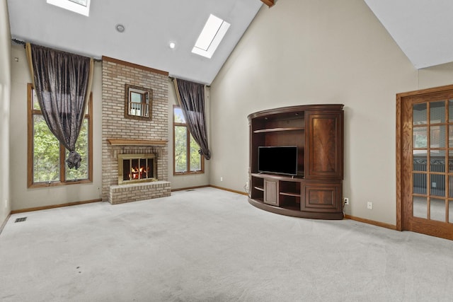 2 Lake Metonga Trl, Grant Park, IL 60940 - unfurnished living room featuring a skylight, high vaulted ceiling, carpet, a brick fireplace, and beamed ceiling
