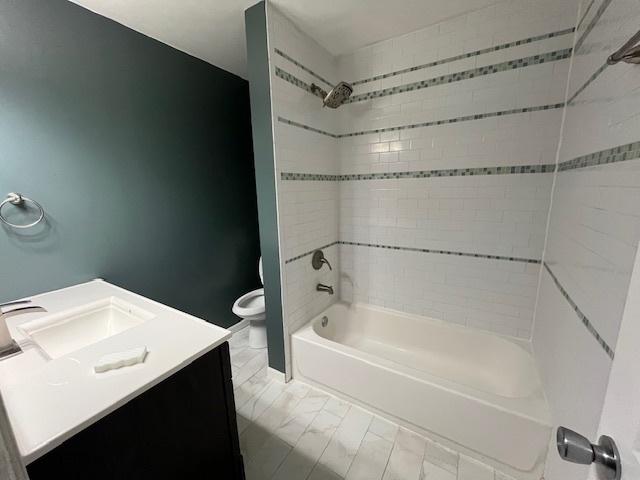 114 Dante Ct, Shorewood, IL 60404 - bathroom with toilet, vanity, and shower / washtub combination