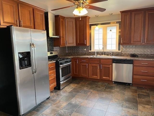 114 Dante Ct, Shorewood, IL 60404 - kitchen with appliances with stainless steel finishes, a sink, wall chimney exhaust hood, ceiling fan, and brown cabinetry
