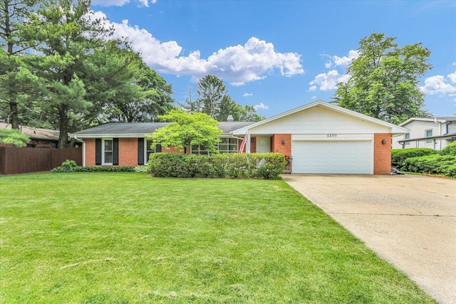 1207 W Kirby Ave, Champaign, IL 61821 - ranch-style house with brick siding, an attached garage, and concrete driveway