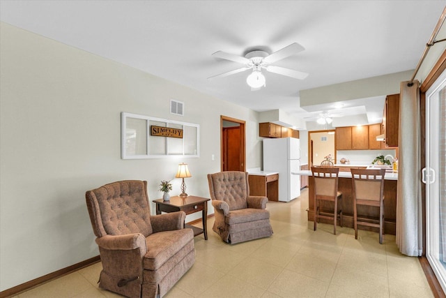 1207 W Kirby Ave, Champaign, IL 61821 - living room featuring a ceiling fan and light floors