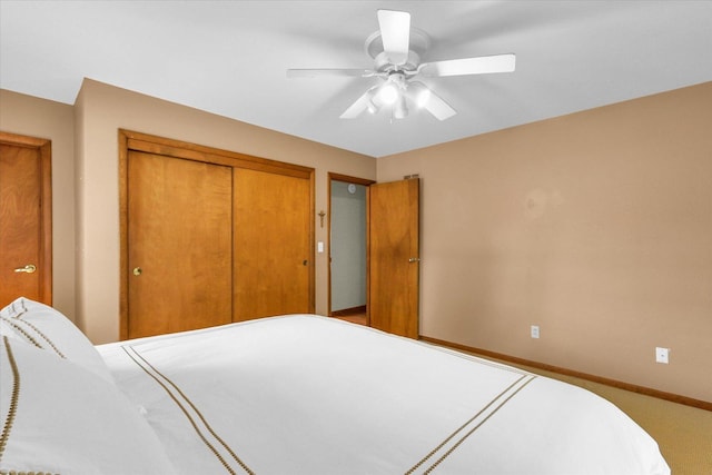 1207 W Kirby Ave, Champaign, IL 61821 - bedroom with a closet and a ceiling fan