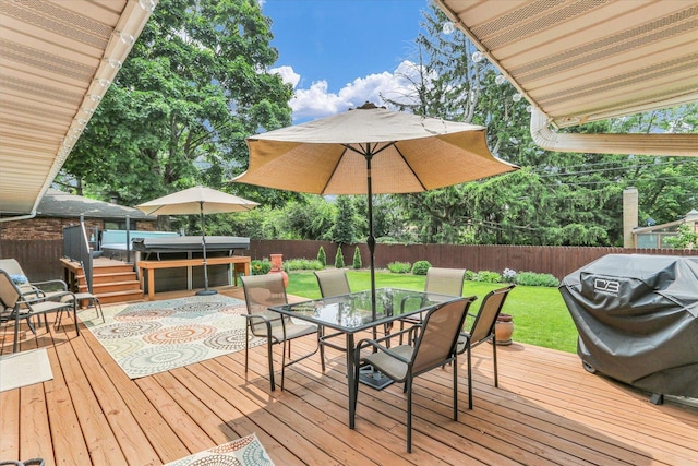1207 W Kirby Ave, Champaign, IL 61821 - deck featuring a fenced backyard, a hot tub, and outdoor dining area
