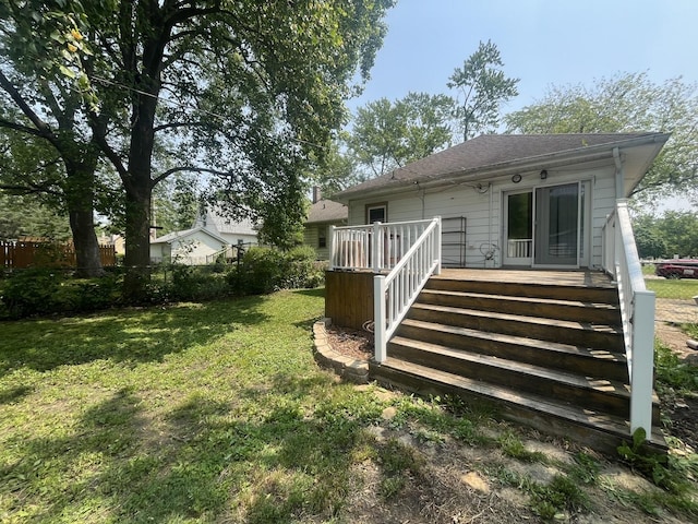 1131 S Nelson Ave, Kankakee, IL 60901 - back of property featuring a wooden deck, roof with shingles, and stairway