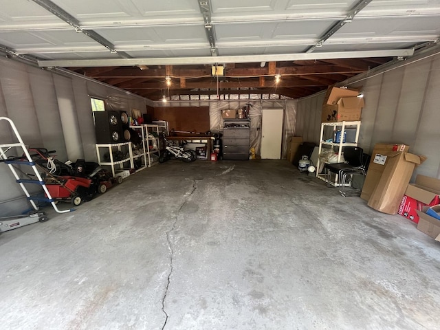 1131 S Nelson Ave, Kankakee, IL 60901 - garage featuring a garage door opener