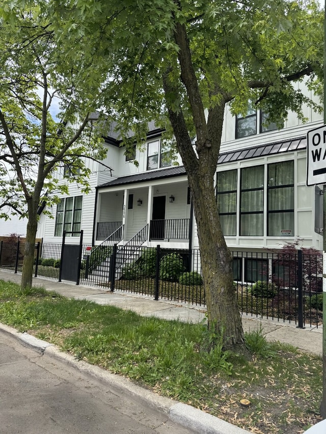view of front of property with a fenced front yard