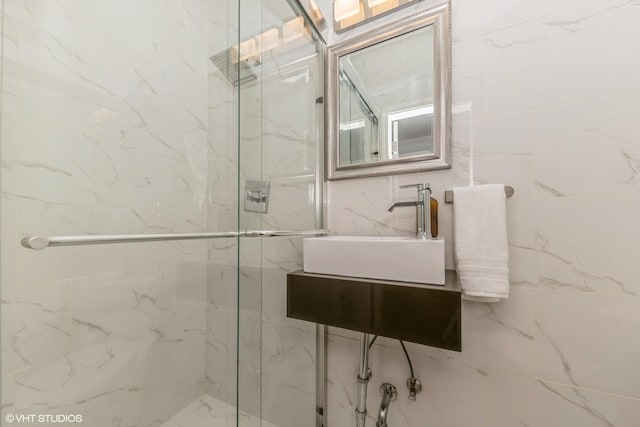1346 S Wabash Ave Unit D, Chicago, IL 60605 - full bathroom with a sink and a marble finish shower