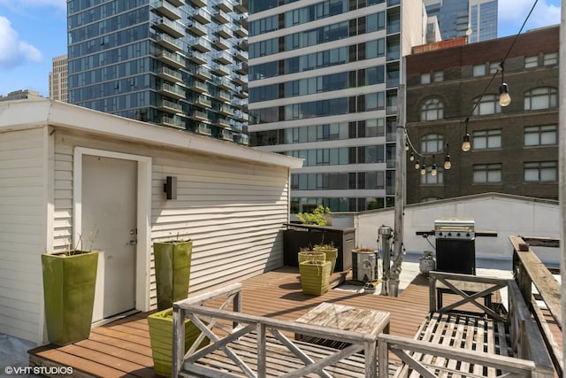 1346 S Wabash Ave Unit D, Chicago, IL 60605 - deck featuring outdoor dining area and area for grilling