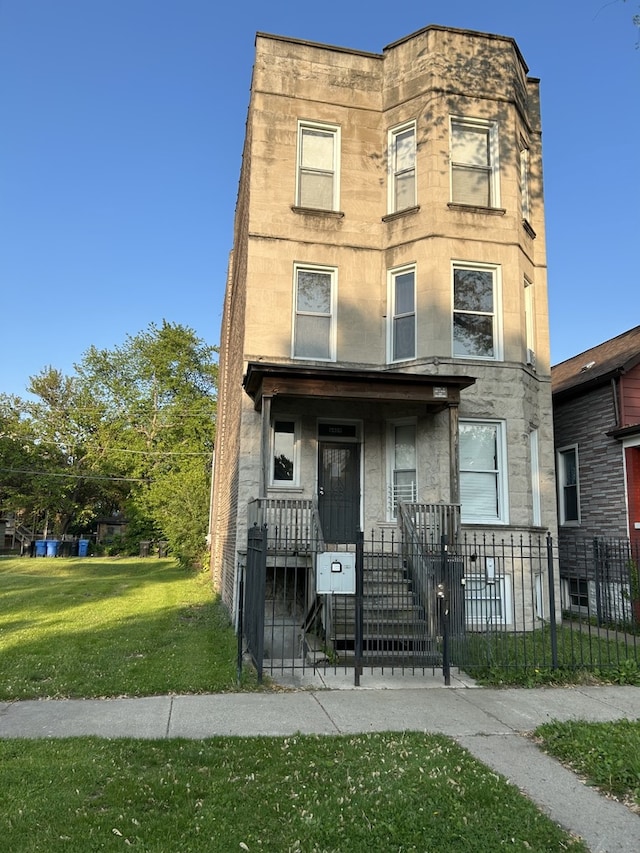 6409 S Rhodes Ave, Chicago, IL 60637 - view of front of home featuring stone siding and a porch
