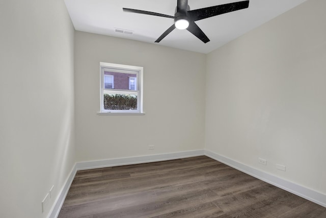 849 W Belle Plaine Ave Unit G, Chicago, IL 60613 - empty room with dark wood-style flooring, a ceiling fan, and baseboards