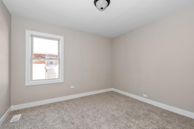 9841 Cook Ave, Oak Lawn, IL 60453 - empty room featuring carpet and baseboards