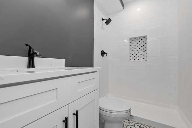 9841 Cook Ave, Oak Lawn, IL 60453 - bathroom with a tile shower, toilet, and vanity