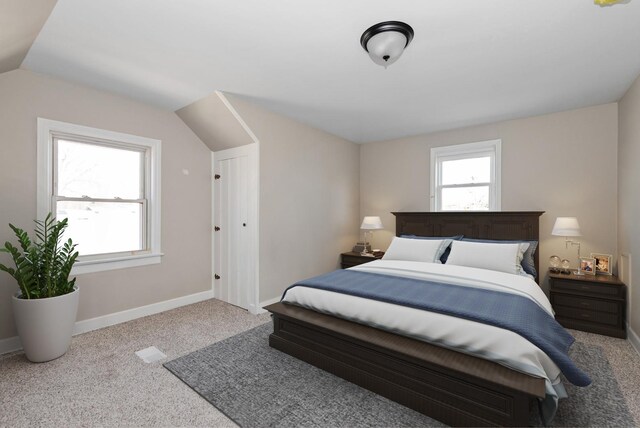 9841 Cook Ave, Oak Lawn, IL 60453 - carpeted bedroom with vaulted ceiling and baseboards