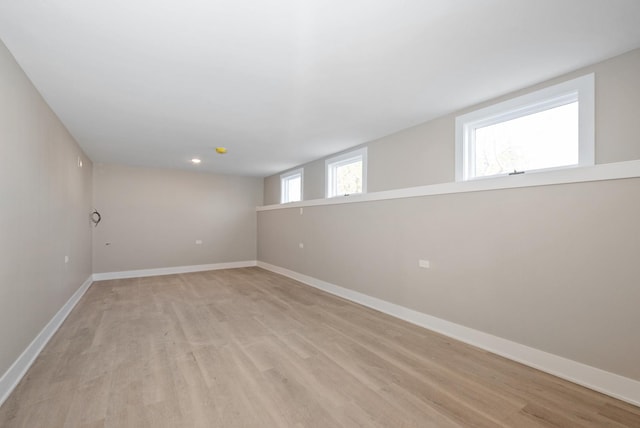 9841 Cook Ave, Oak Lawn, IL 60453 - basement featuring light wood-style flooring and baseboards