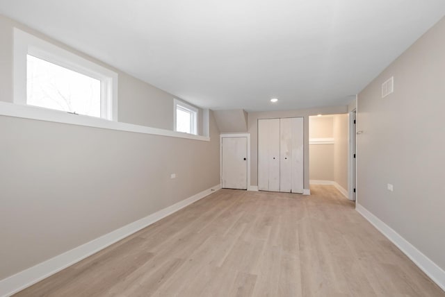 9841 Cook Ave, Oak Lawn, IL 60453 - unfurnished bedroom with baseboards, light wood-style floors, and recessed lighting