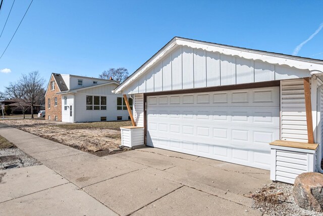 9841 Cook Ave, Oak Lawn, IL 60453 - view of front of home featuring board and batten siding and a garage