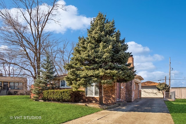 608 N Craig Pl, Addison, IL 60101 - obstructed view of property with a front yard, brick siding, and an outbuilding