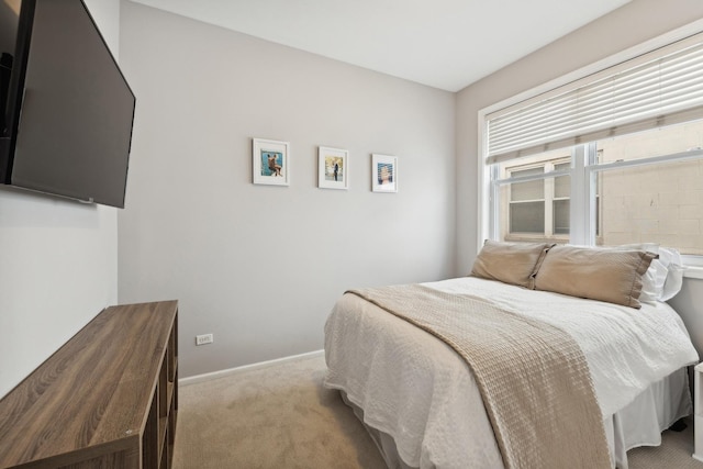 1730 W Diversey Pkwy Unit 2E, Chicago, IL 60614 - bedroom featuring light colored carpet and baseboards