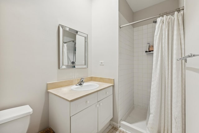 1730 W Diversey Pkwy Unit 2E, Chicago, IL 60614 - bathroom featuring toilet, vanity, and tiled shower