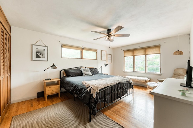 707 Coolidge Pl, Rockford, IL 61107 - bedroom featuring light wood-type flooring, a closet, and a ceiling fan