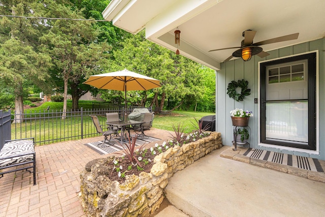 707 Coolidge Pl, Rockford, IL 61107 - view of patio / terrace featuring ceiling fan and outdoor dining space