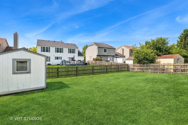 1313 Edington Ln, Mundelein, IL 60060 - fenced backyard with a residential view and a storage unit