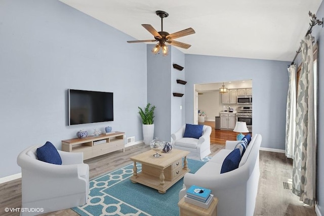 1313 Edington Ln, Mundelein, IL 60060 - living room with ceiling fan, wood finished floors, and high vaulted ceiling
