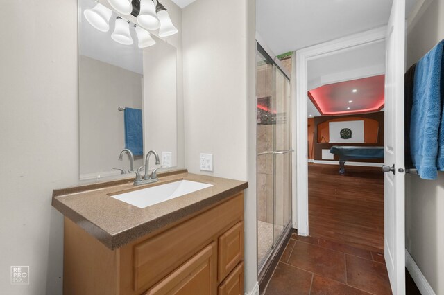 12732 S Austin Ave, Palos Heights, IL 60463 - bathroom featuring vanity, a stall shower, tile patterned floors, and a chandelier