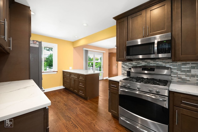 12732 S Austin Ave, Palos Heights, IL 60463 - kitchen with appliances with stainless steel finishes, decorative backsplash, dark wood-style flooring, dark brown cabinetry, and recessed lighting