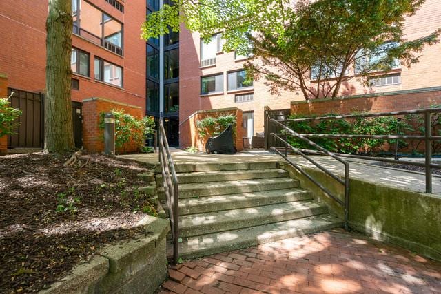 1115 S Plymouth Ct Unit 124, Chicago, IL 60605 - doorway to property with brick siding