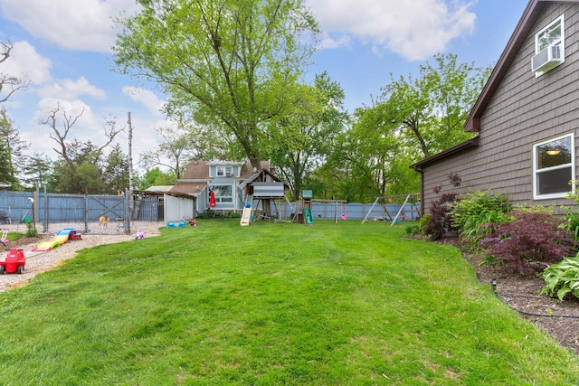 20425 N Hazelcrest Rd, Palatine, IL 60074 - view of yard featuring a playground and a storage unit